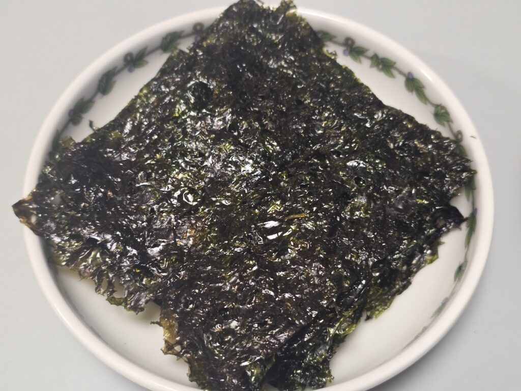 5 Umami Secrets of Ganjang-gejang highlighting the textured raw unseasoned seaweed for the perfect wrap
