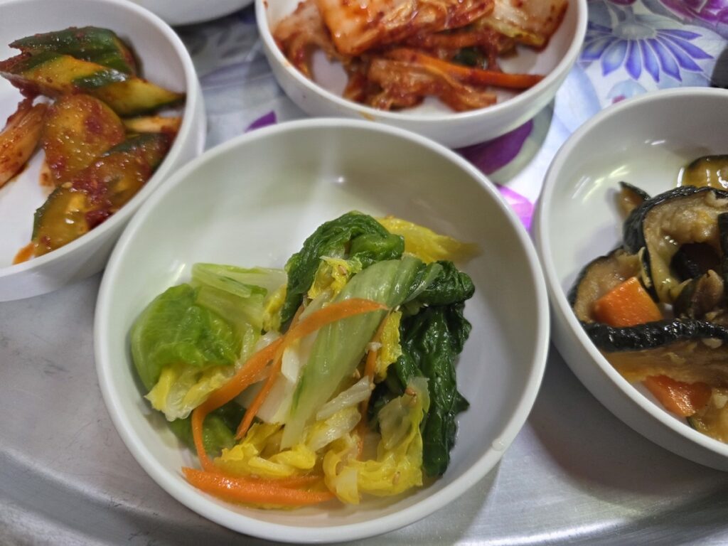 8 Vegan Banchan Secrets for a Stress-Free Korean Food Trip in authentic white ceramic tableware