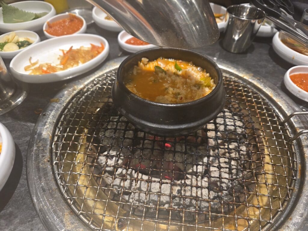 Boiling Doenjang-bab on embers for a Post-BBQ Meal Ritual in Korea