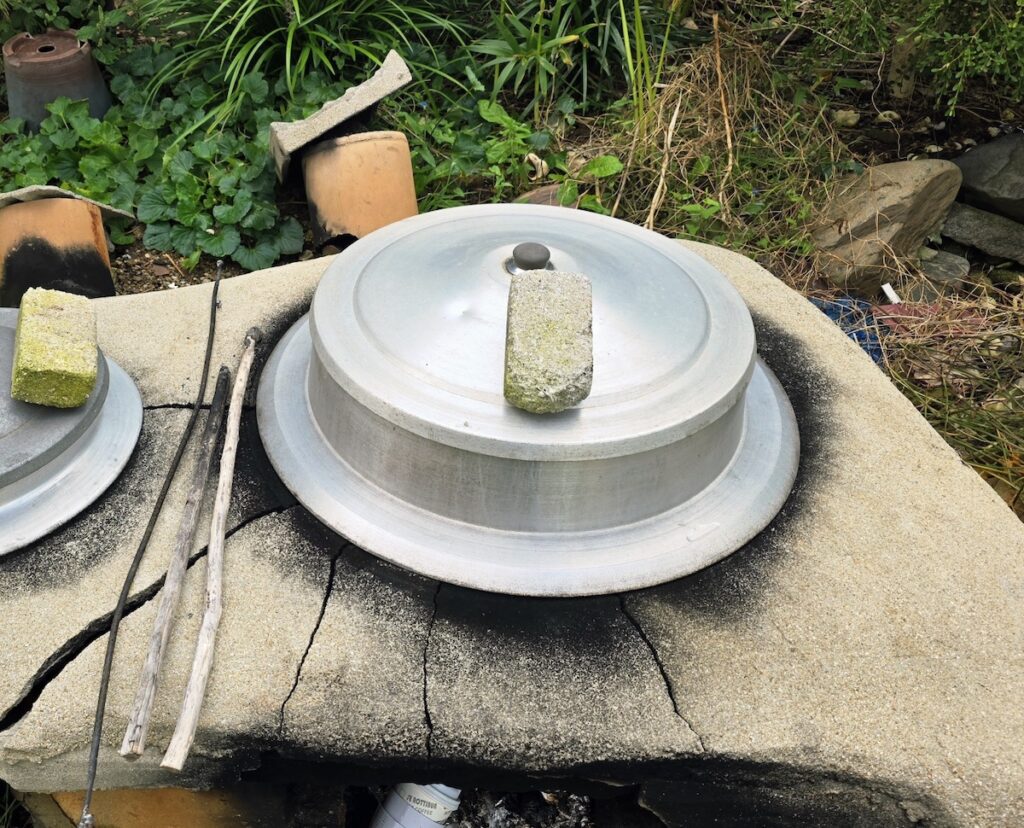 A close-up of crackling firewood in an Agungi hearth, capturing the sensory Scent of Romance during a Korea Travel 2026 rural experience.
