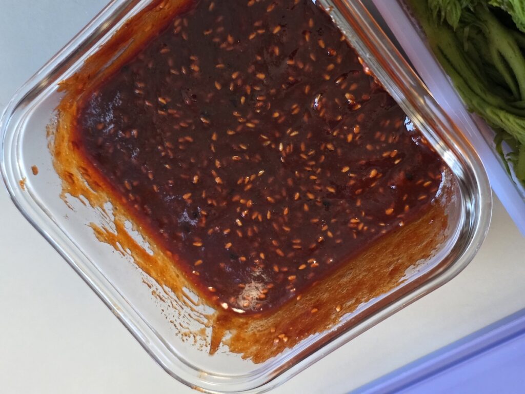 Red spicy Chojang sauce used in the Food Challenge with Korean mountain herbs.