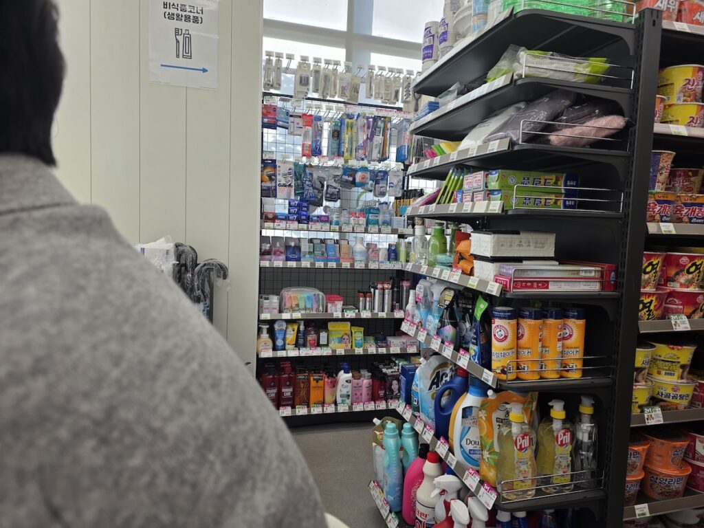 inside a Korea convenience store with food options at GS25 CU and 7 Eleven showing ready to eat meals and cheap food choices