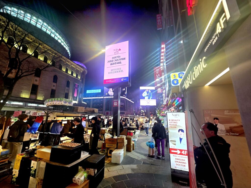 Myeongdong street food in Seoul with various cheap eats and popular Korean street food for tourists at night market