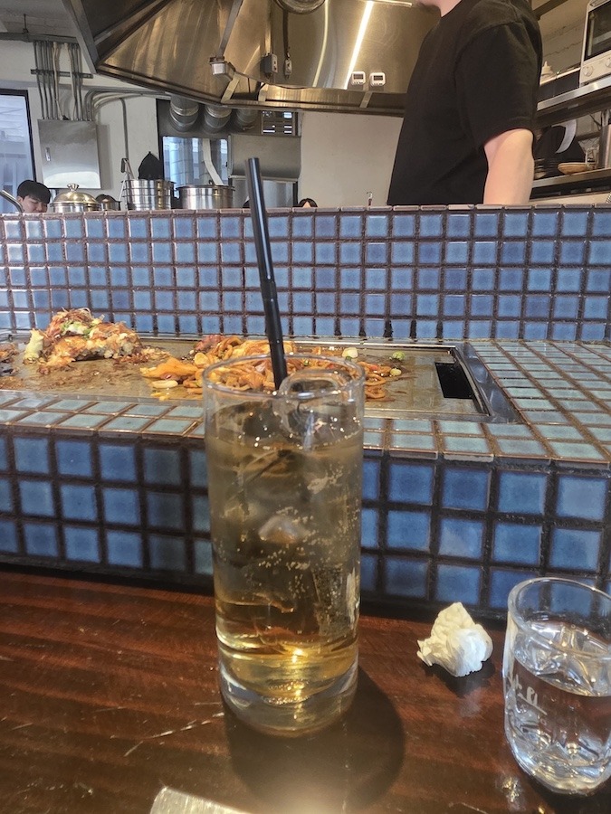 what to eat in Hongdae showing local restaurant grill atmosphere with drinks and casual dining experience in Seoul